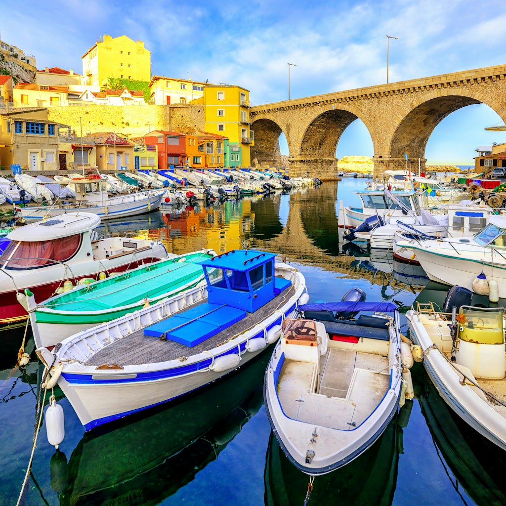Small fishing harbor Vallon des Auffes with traditional picturesque houses and boats, Marseilles, France
