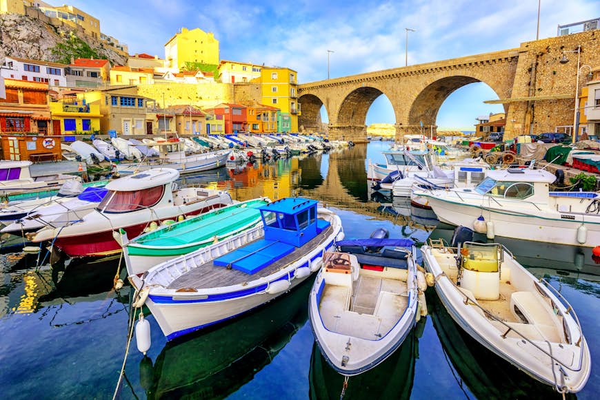 Small fishing harbor Vallon des Auffes with traditional picturesque houses and boats