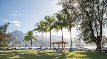 Hanalei, Kauai, February 8, 2016 - Hanalei Beach Park Pavilion is a popular beach for tourists & locals & has the often photographed Hanalei Pier, located on the North Shore of Kauai, Hawaii