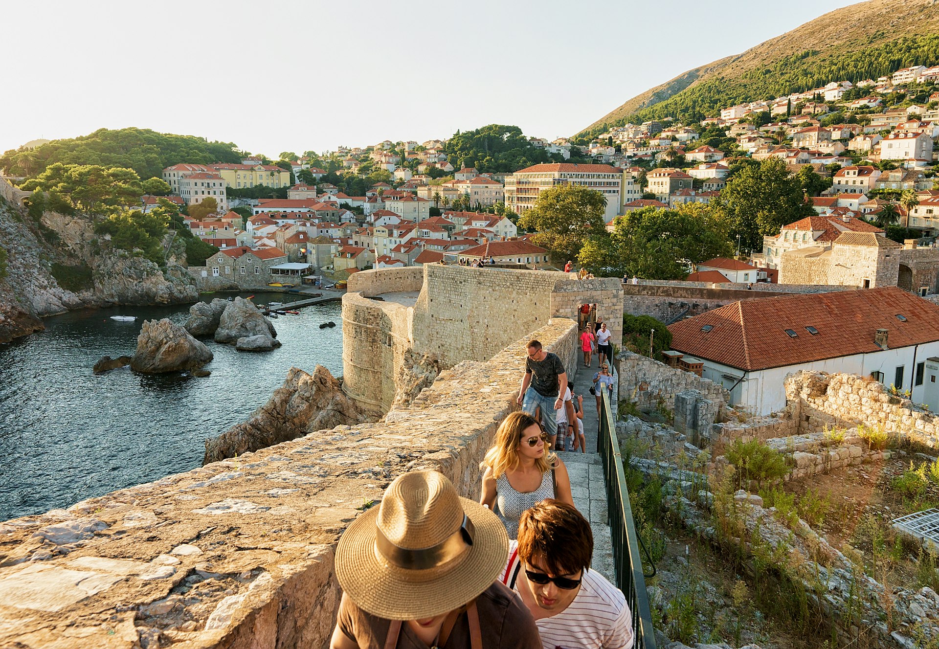 People at the Old City Walls in Dubrovnik, Croatia, on a sunny day in August