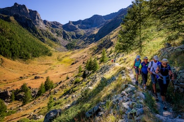 August 12, 2017: A group of hikers walking on a path in the Parc National du Mercantour.