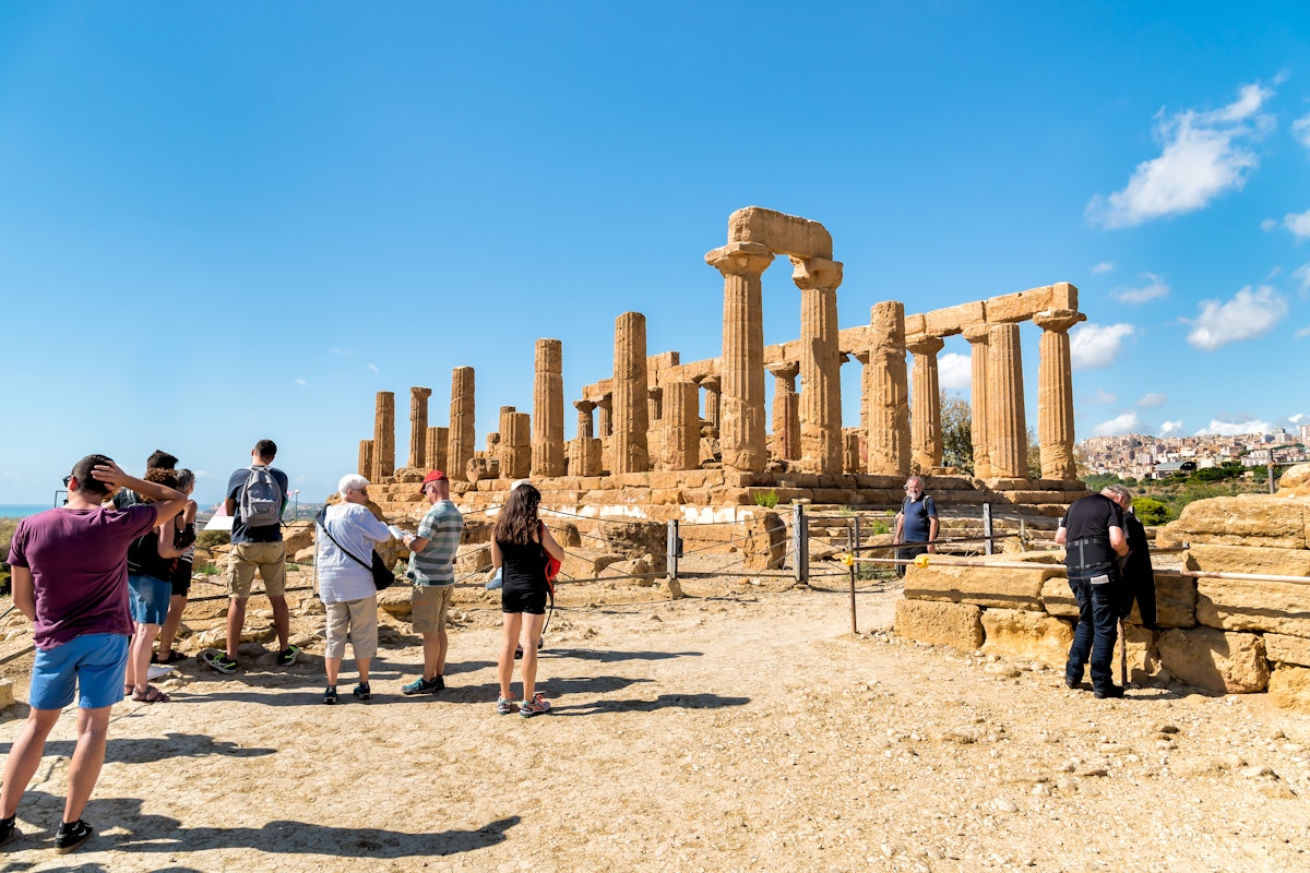 Agrigento, Sicily, Italy - October 9, 2017: Tourists visiting Park of the Valley of the Temples in Agrigento.