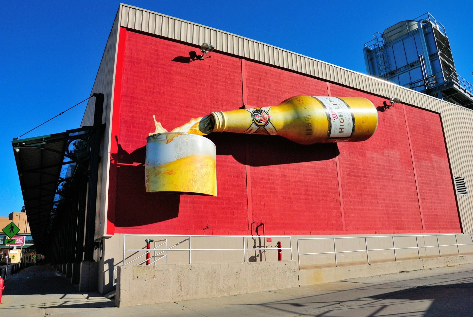 A giant beer bottle and glass display on the exterior of the the Miller Brewery complex in Milwaukee, Wisconsin, Great Lakes, USA