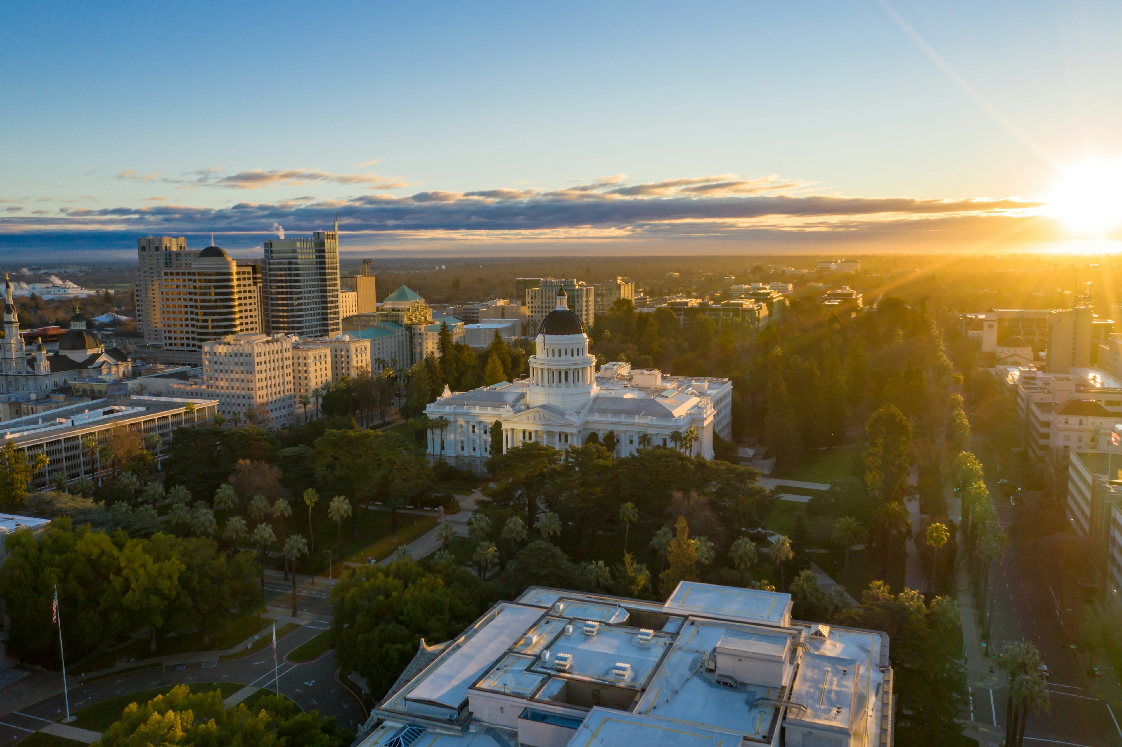 Sacramento, CA - United States of America - 01-07-2021: "California State Capitol Building, Downtown Sacramento, CA during Sunrise - Aerial Drone View"; Shutterstock ID 1889675725; your: Brian Healy; gl: 65050; netsuite: Lonely Planet Online Editorial; full: Best neighborhoods in Sacramento