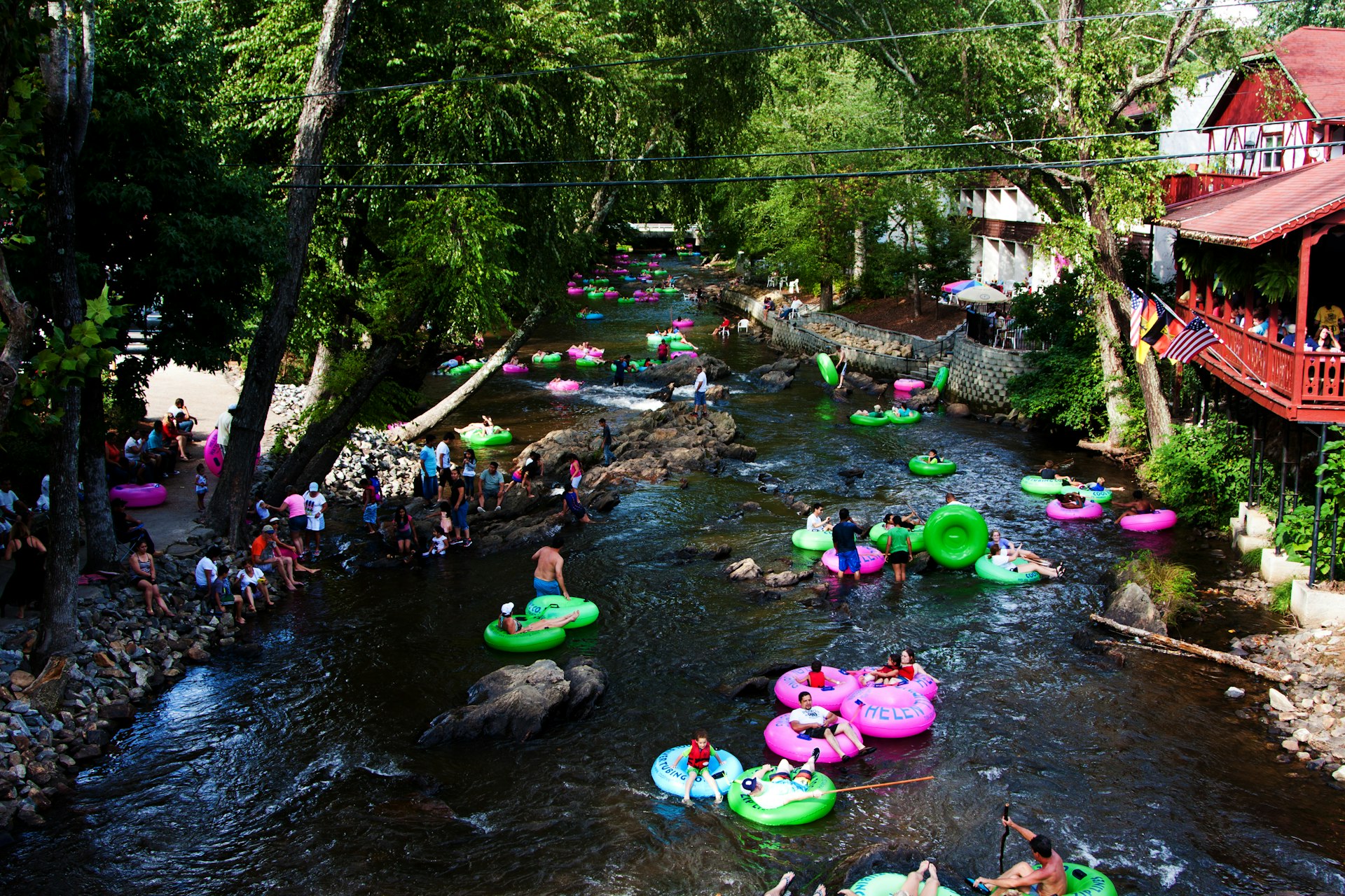 An overhead shot of a crowd of tubers in the waters of the Chattahoochee River, Helen, GA