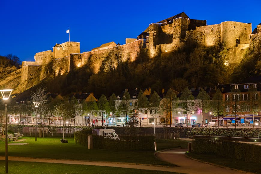 A view of the village and illuminated castle of Bouillon, Ardennes, Belgium, Europe