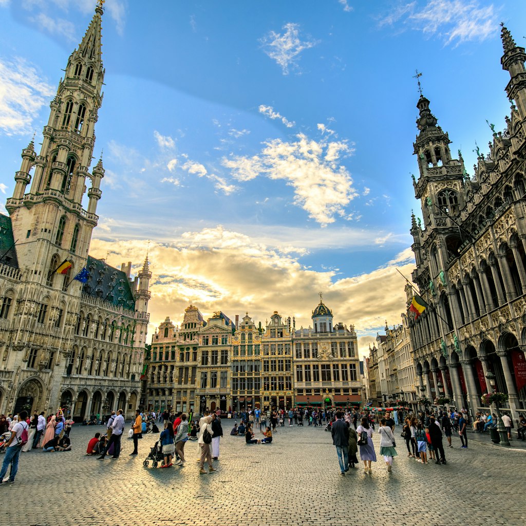 Tourists on the open square of the Grand Place in Brussels, Belgium