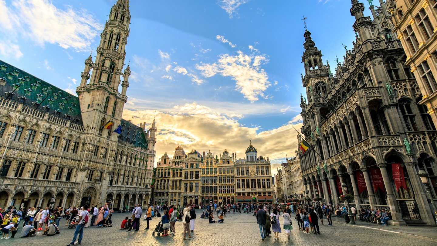 Tourists on the open square of the Grand Place in Brussels, Belgium