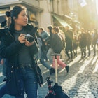 A young female traveller on a cobbled street in Brussels, Belgium