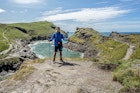 Richard Collett in front of Boscastle in Cornwall along  the South West Coast Path.