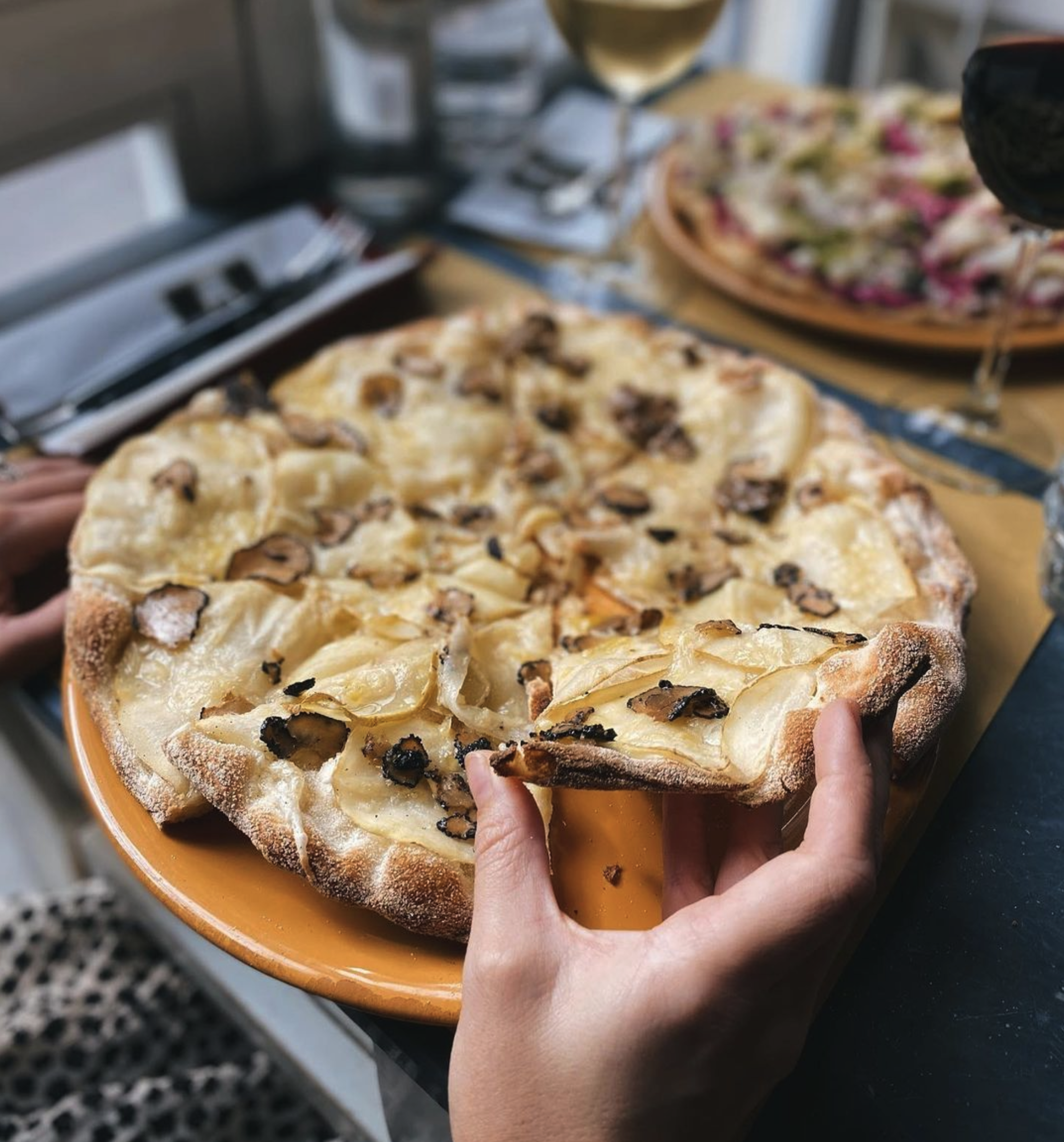 Buddy Veggy restaurant in Rome, Italy. Potato and truffle pizza.