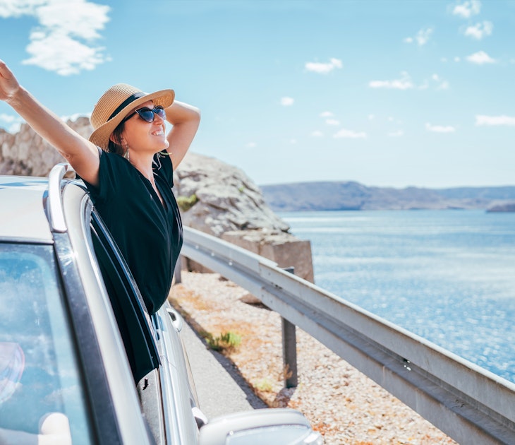 A woman enjoying the sea views on the Adriatic coast of Croatia