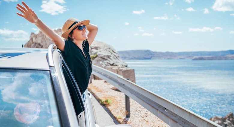 A woman enjoying the sea views on the Adriatic coast of Croatia