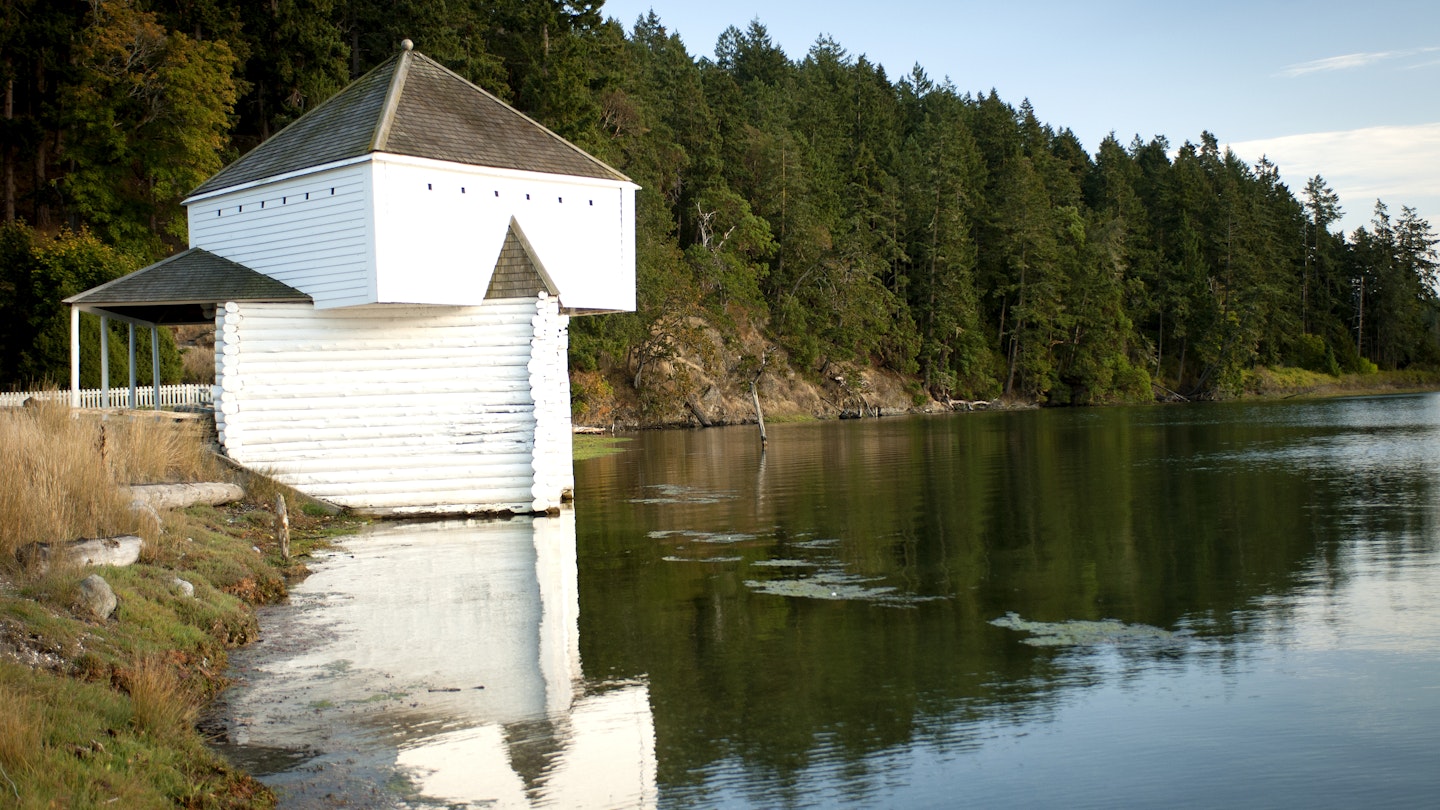 Blockhouse building stands at the water's edge at English Camp, site of a Royal Marines camp set up in 1860 when British and American naval forces shared San Juan Island in the San Juan islands in Washington State, USA (Photo by Nik Wheeler/Corbis via Getty Images)