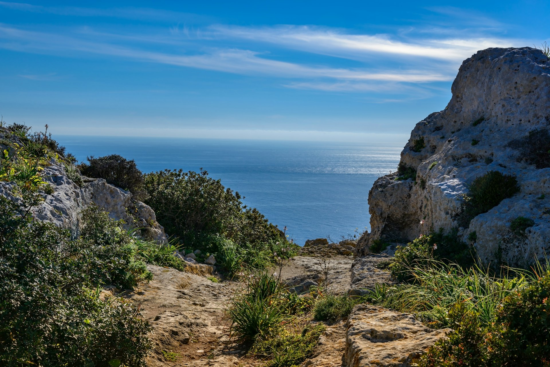 A path through the rocky landscape at Malta's Dingli Cliffs
