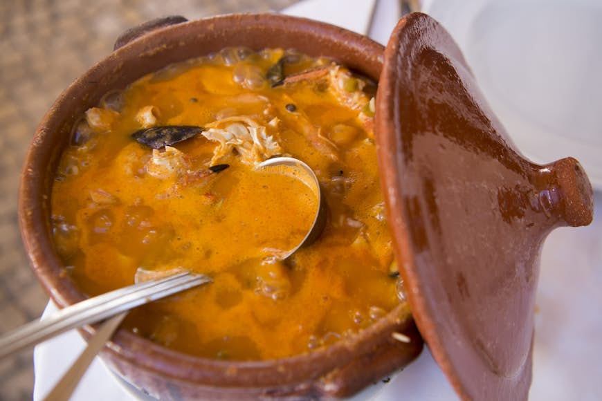 Enjoy foods like arroz de marisco in Lagos, Portugal 