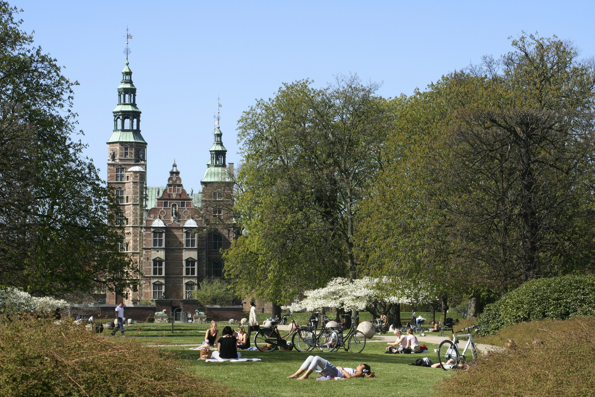 People relaxing in the grounds of the Rosenberg Slot, Copenhagen