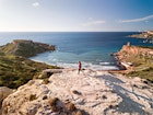 Aerial view of a young man walking along the coast during winter season - stock photo
Aerial view of a young man walking along the west coast of Malta