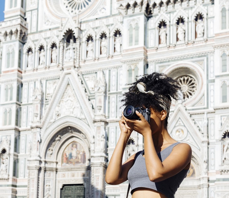 Tourist with camera in Milan