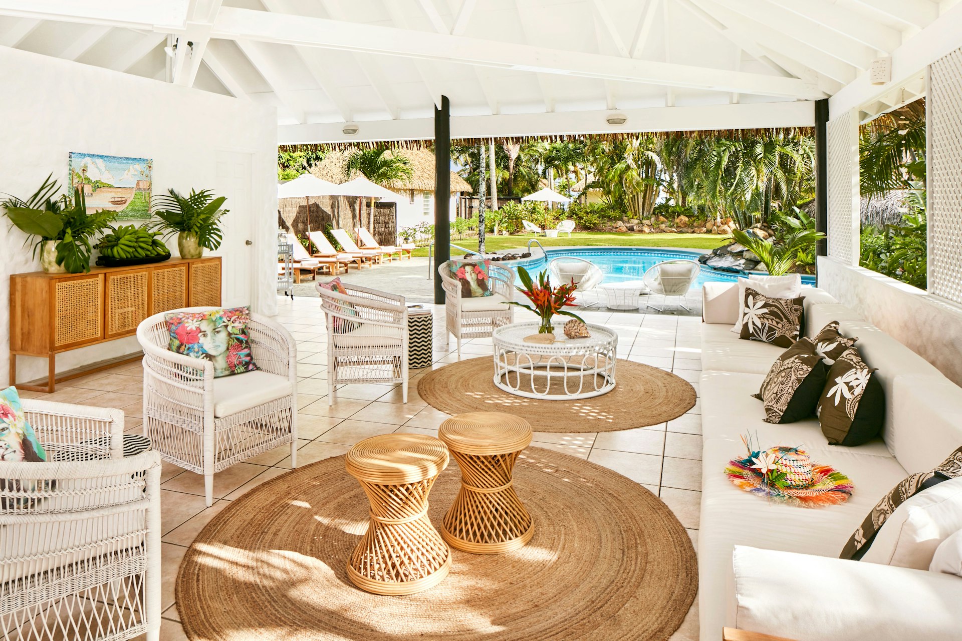 Ano open-air sitting area at the tropical Motu Villas