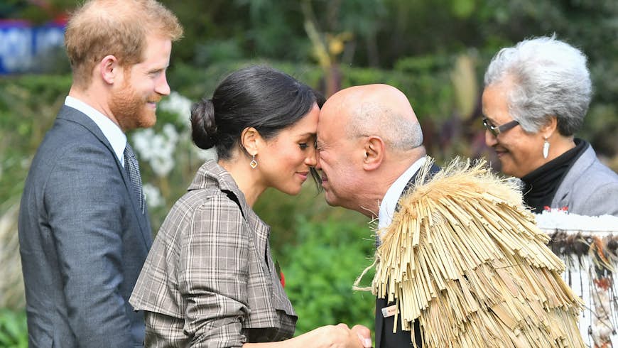 Prince Harry, Duke of Sussex and Meghan, Duchess of Sussex greet Maori elders while attending a traditional welcome ceremony on the lawns of Goverment House on October 28, 2018 in Wellington, New Zealand