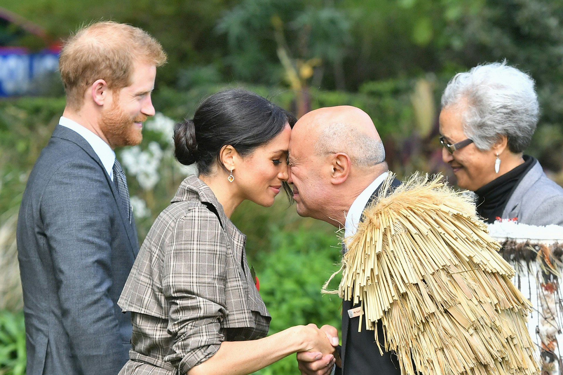 Prince Harry, Duke of Sussex and Meghan, Duchess of Sussex greet Maori elders while attending a traditional welcome ceremony on the lawns of Goverment House on October 28, 2018 in Wellington, New Zealand