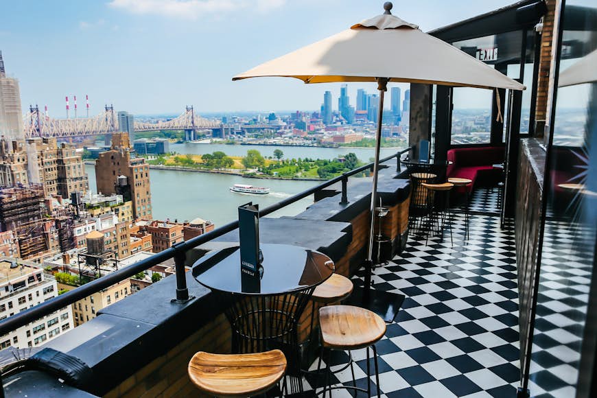 Views of the East River and Roosevelt Island from Ophelia Lounge