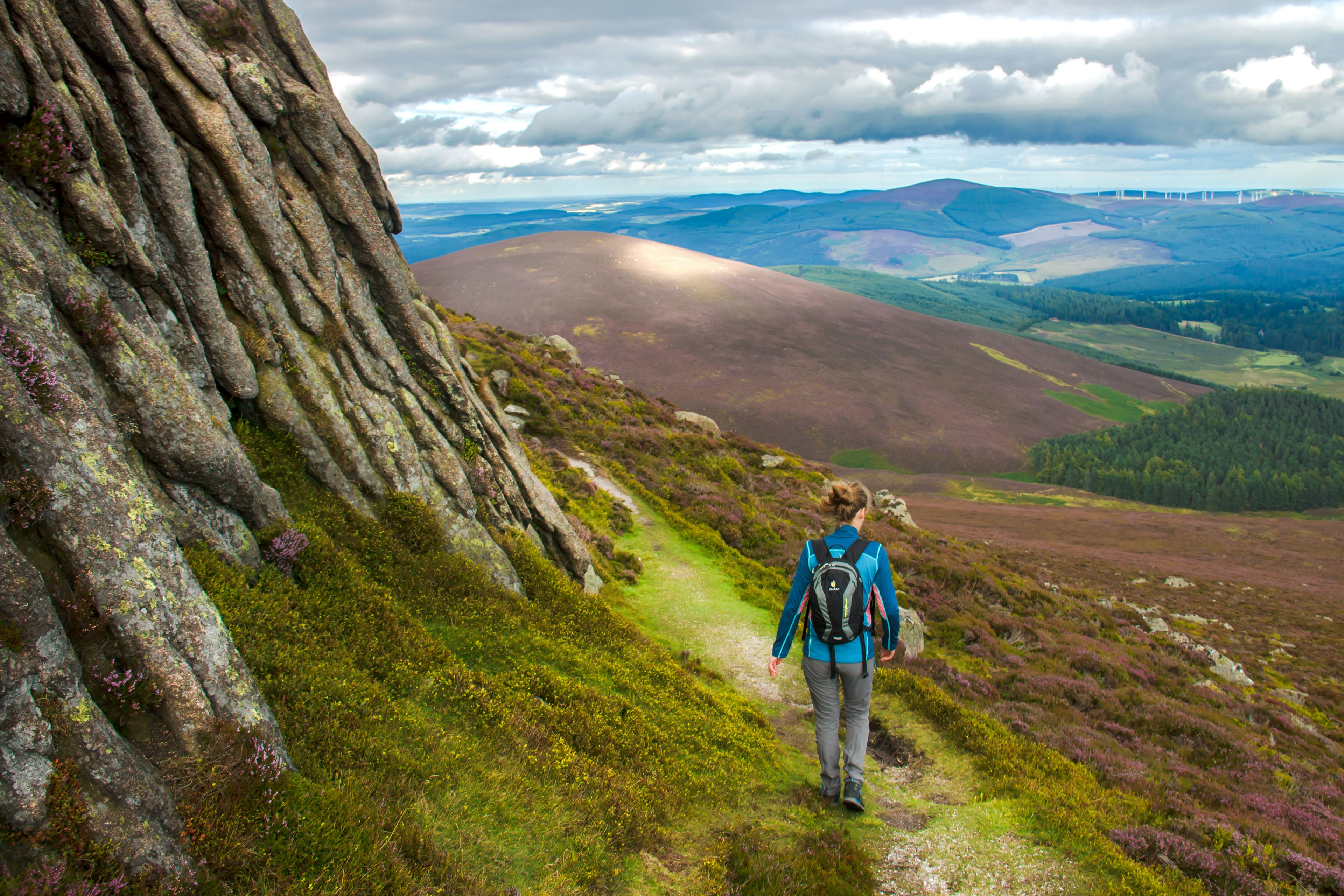 Female hiker walking in Cairngorms National Park, Scotland