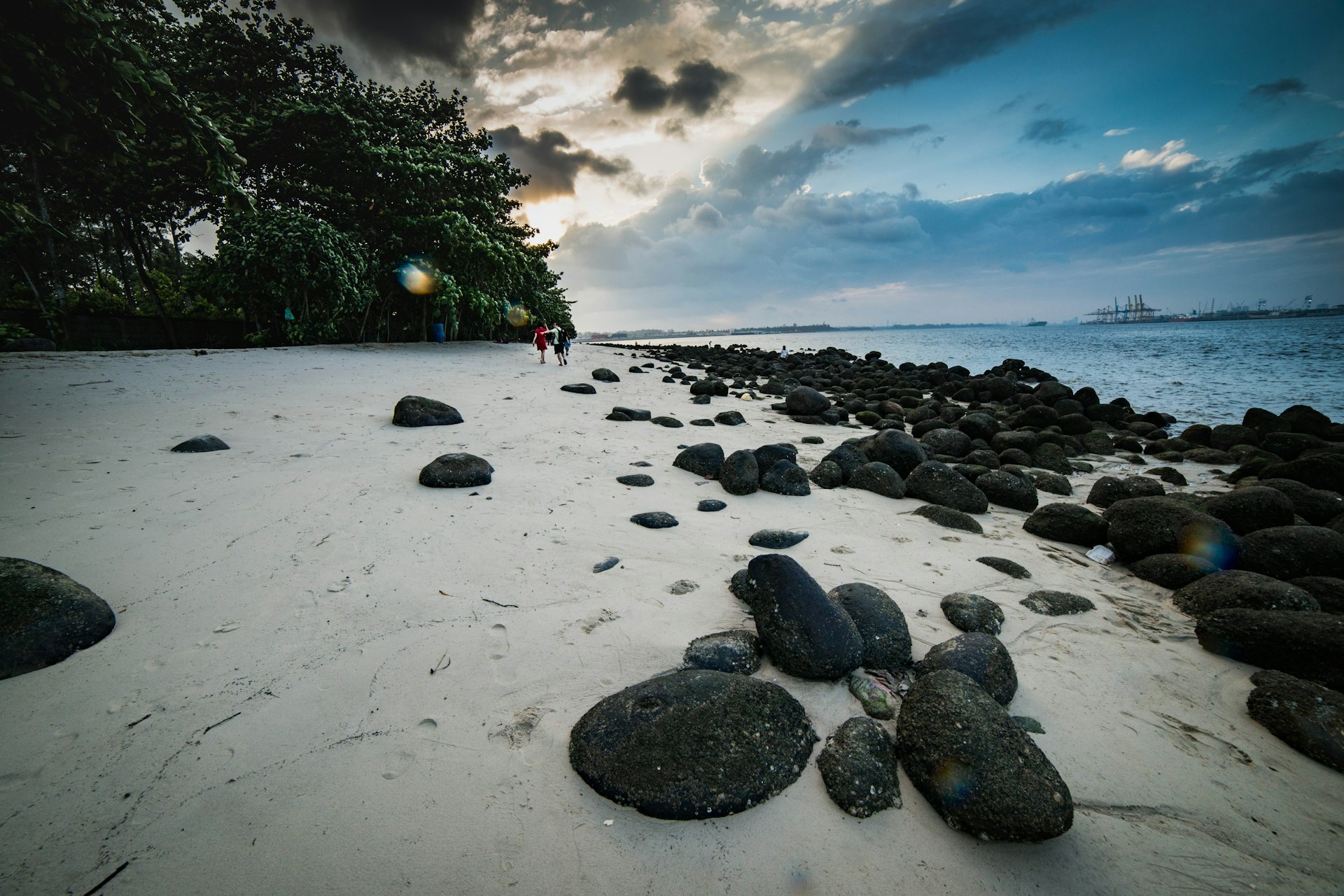 Black boulders on the Punggol Beach, Singapore, Southeast Asia