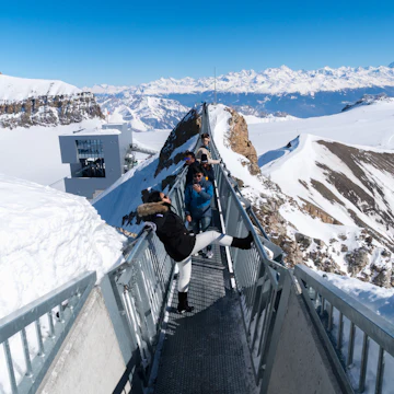 Tourists on Titlis Cliff Walk, a suspension bridge at Mount Titlis in Engelberg, Switzerland.
