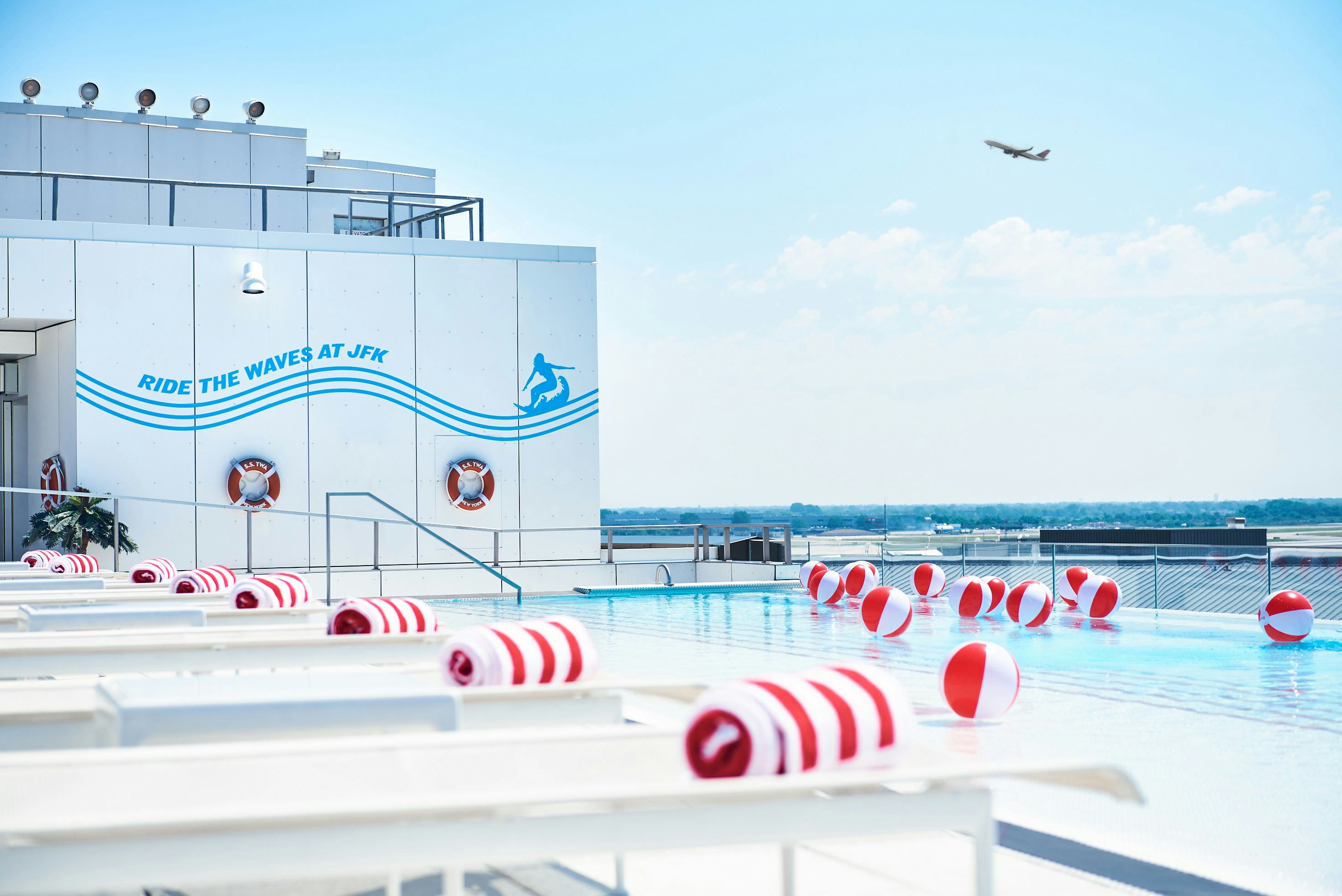 The infinity pool at TWA Hotel's rooftop deck overlooks JFK