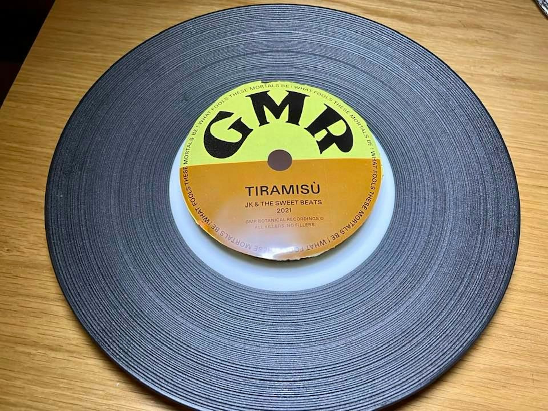 A tiramisu in the shape of a vinyl record at Grandmaster Recorders restaurant in LA