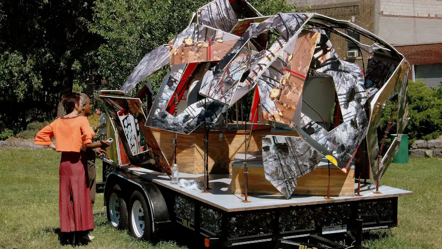 A couple views a contemporary art installation at Socrates Sculpture Park in Astoria, Queens, New York City, New York, USA