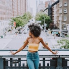 Beautiful american girl posing in New york; Shutterstock ID 1310396668; your: Brian Healy; gl: 65050; netsuite: Lonely Planet Online Editorial; full: Best free things to do in New York
