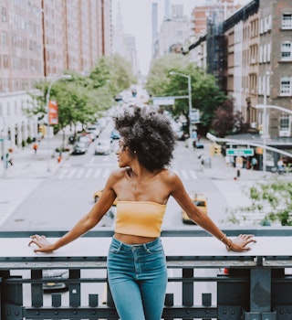 Beautiful american girl posing in New york; Shutterstock ID 1310396668; your: Brian Healy; gl: 65050; netsuite: Lonely Planet Online Editorial; full: Best free things to do in New York