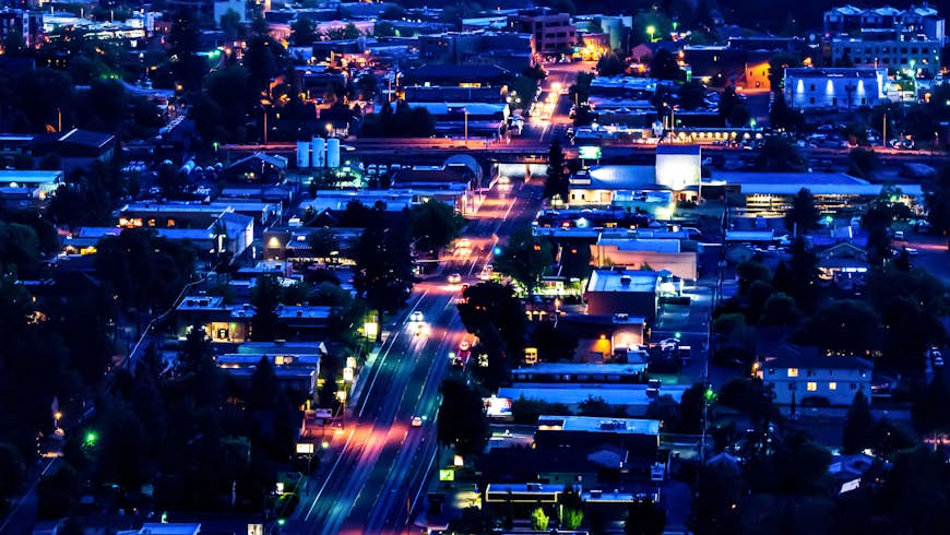 Close-up shot of Hwy 20 in Bend, Oregon by night, shot from the top of Pilot Butte Parl
