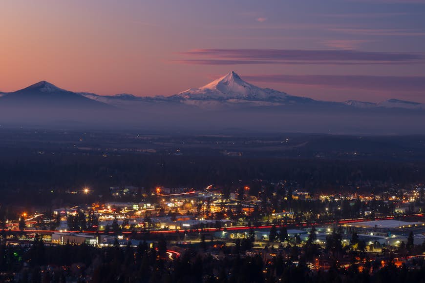 Bend, Oregon cityscape with Mt Jefferson at sunset
