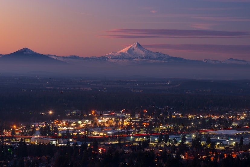 Bend Oregon cityscape with Mt Jefferson at sunset; Shutterstock ID 1650409732; your: Brian Healy; gl: 65050; netsuite: Lonely Planet Online Editorial; full: Best neighborhoods in Bend, OR
