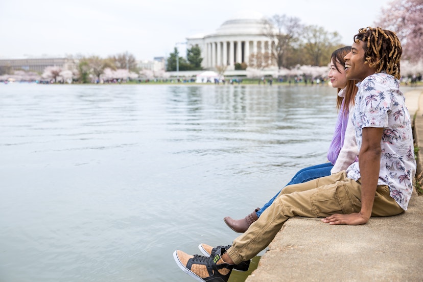 Young couple enjoying Springtime in Washington DC Peak Bloom of the Cherry blossoms; Shutterstock ID 1070150492; your: Claire Naylor; gl: 65050; netsuite: Online ed; full: Washington free update