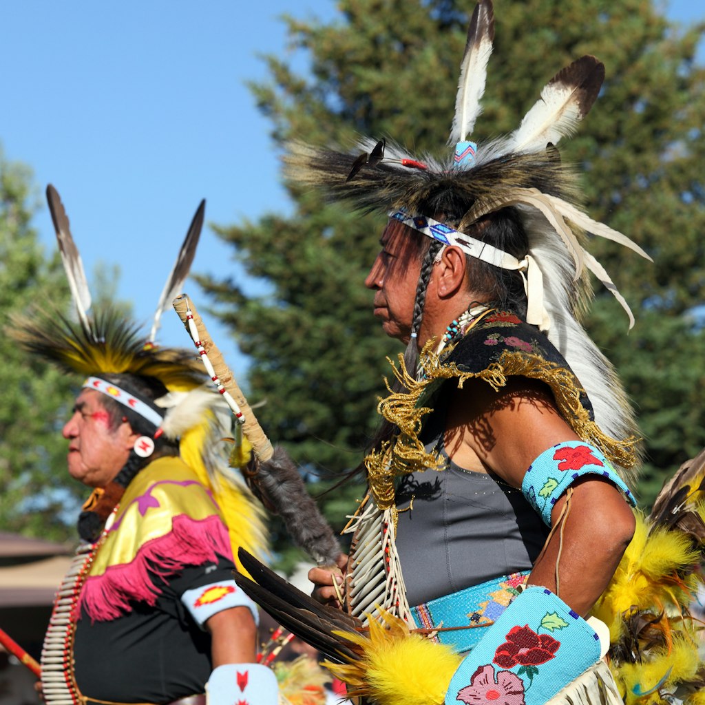 Cody, WY, USA - June 2016: Plains Indian Museum Pow-wow. Dancers in colorful traditional dress