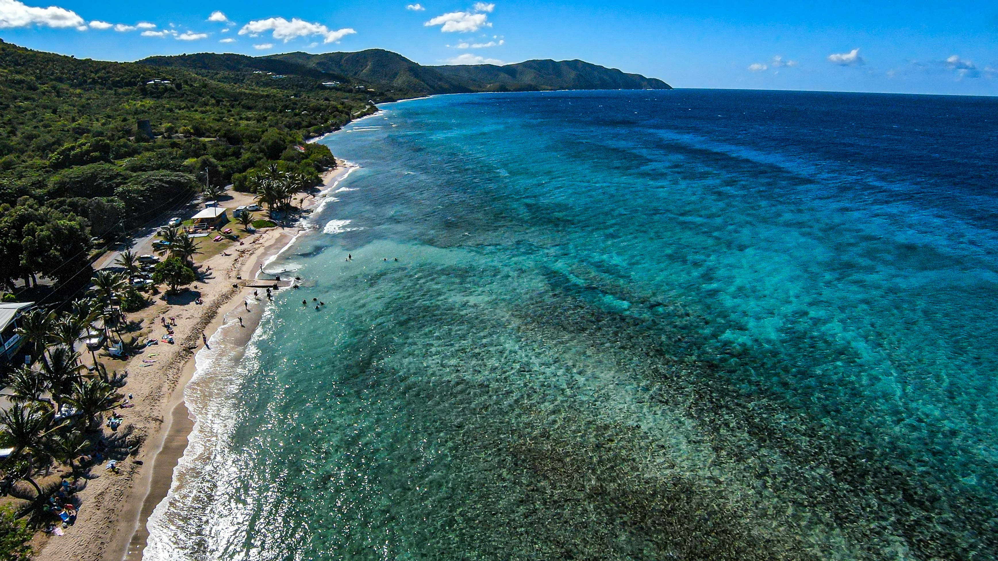 Aerial view of Cane Bay Beach, St. Croix, US Virgin Islands, with the coral reefs visible beneath the water