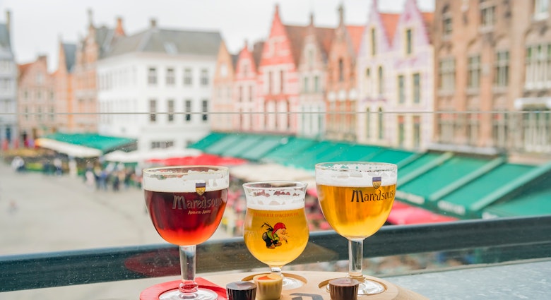 Beer and chocolate at Market Place on April 28, 2018 at Brugge, Belgium.