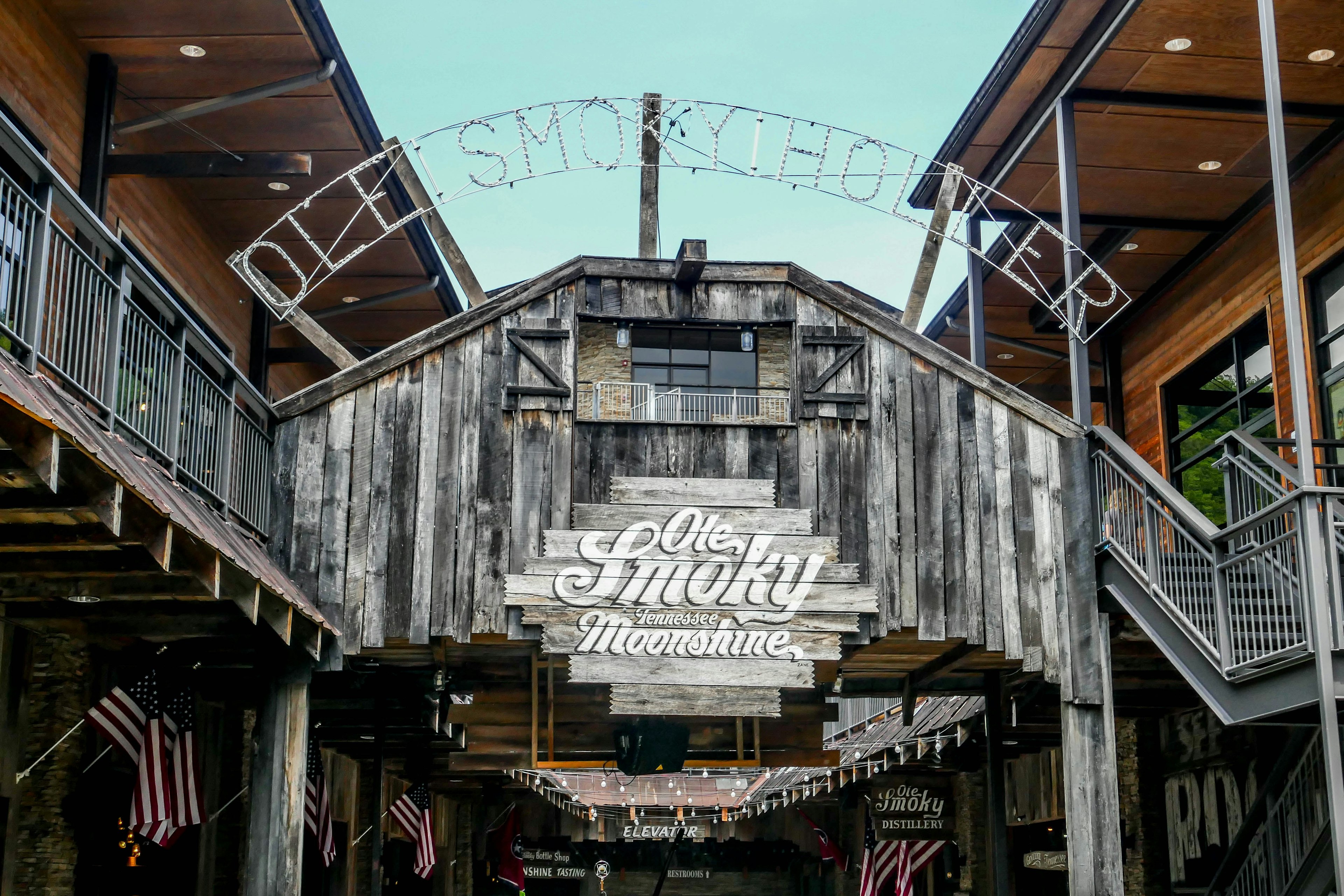 The wooden exterior of the Ole Smoky Moonshine building in Gatlinburg, Tennessee