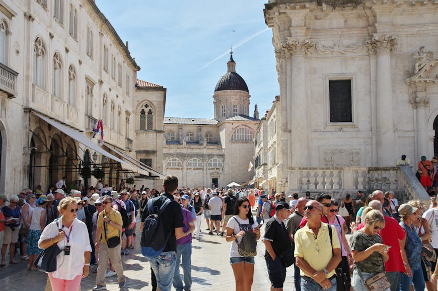 Visitors crowd Luza Square in Dubrovnik's Old Town