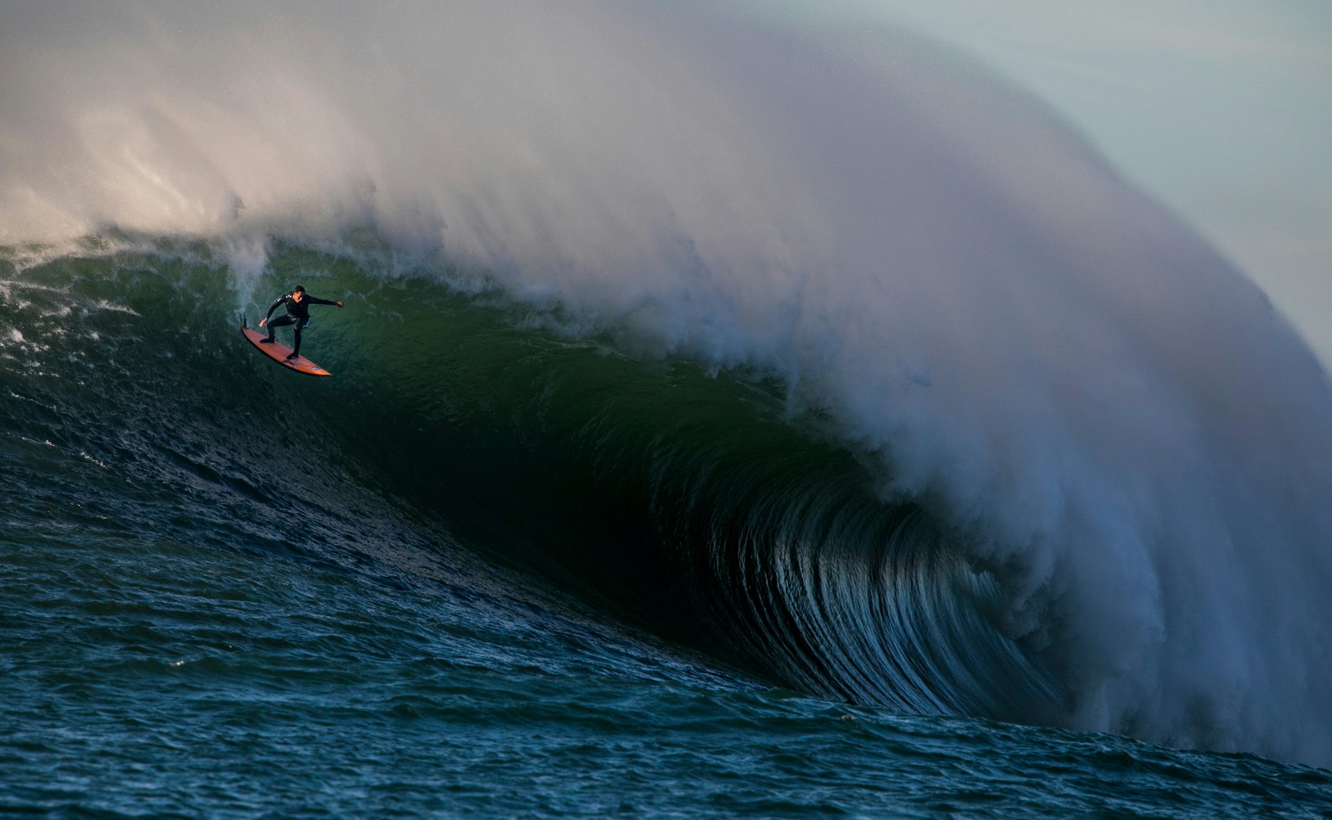 shuttSurfers ride massive waves at Mavericks, a surf break south of San Francisco in California