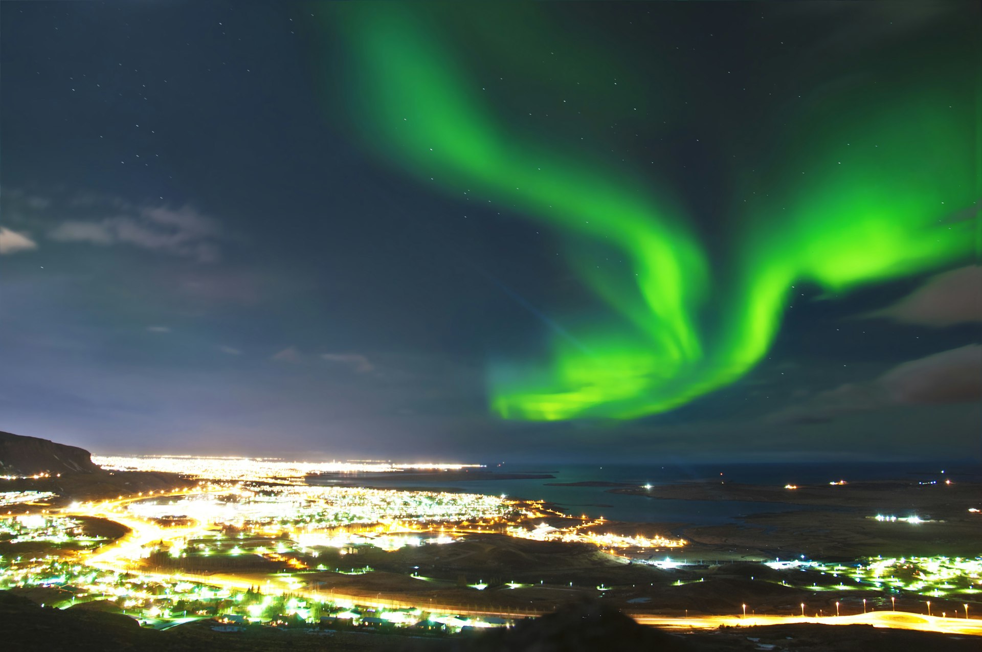Green Northern Lights above Reykjavik, Iceland