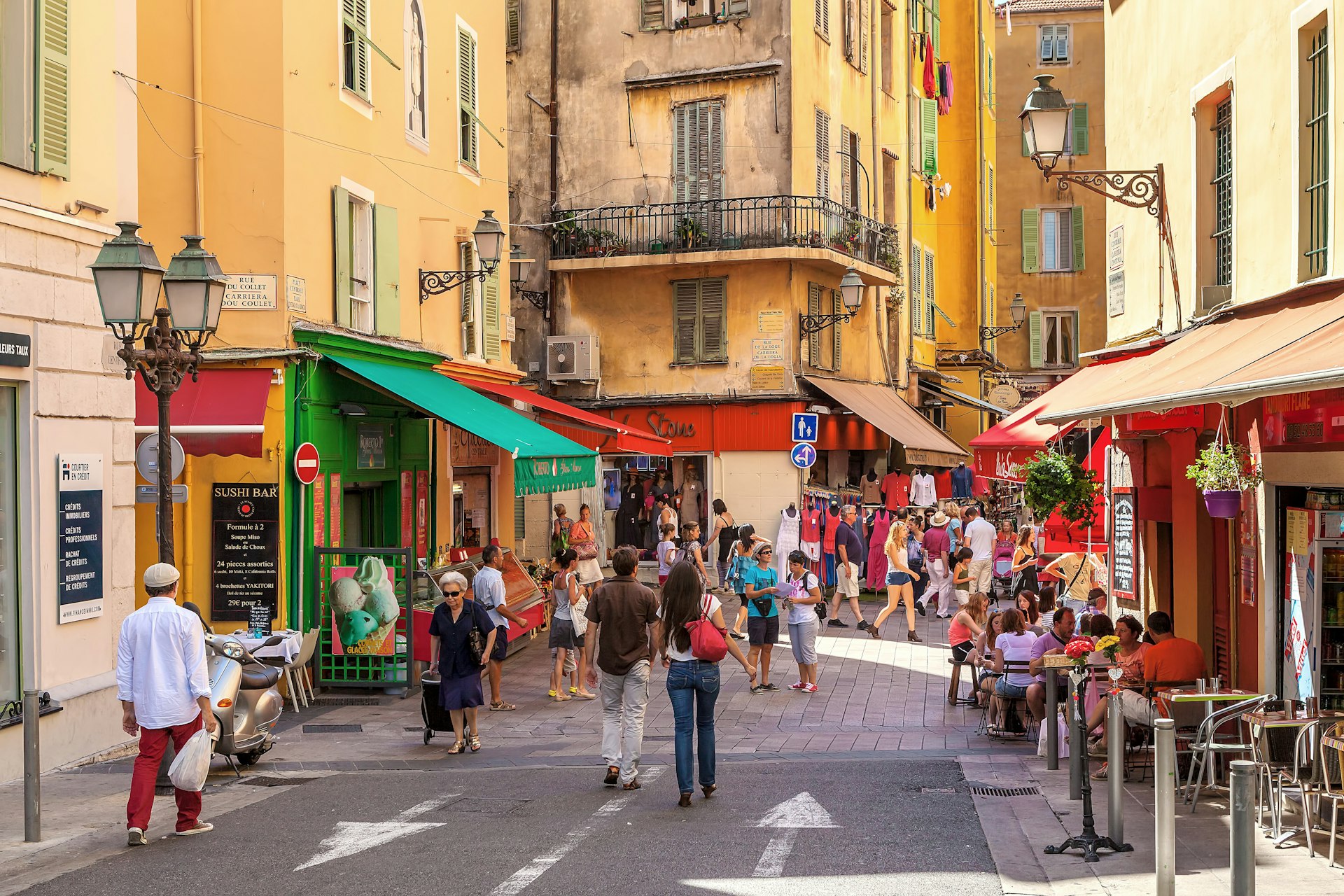 Tourists wandering in the old city of Nice 
