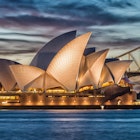 SYDNEY - OCTOBER 12, 2015: The Iconic Sydney Opera House is a multi-venue performing arts centre also containing bars and outdoor restaurants.