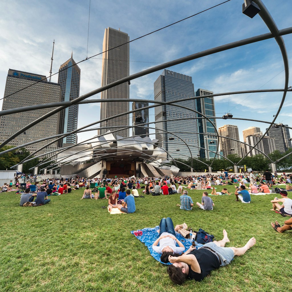 Chicago, IL/USA - circa July 2015: People at Jay Pritzker Pavilion at Millennium Park in Chicago, Illinois