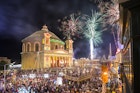 MOSTA, MALTA - 15 AUG. 2016: Fireworks at the Mosta festival at night with the famous Mosta Dome and the People of Malta are celebrating the Feast of the Assumption of 'Santa Maria'.